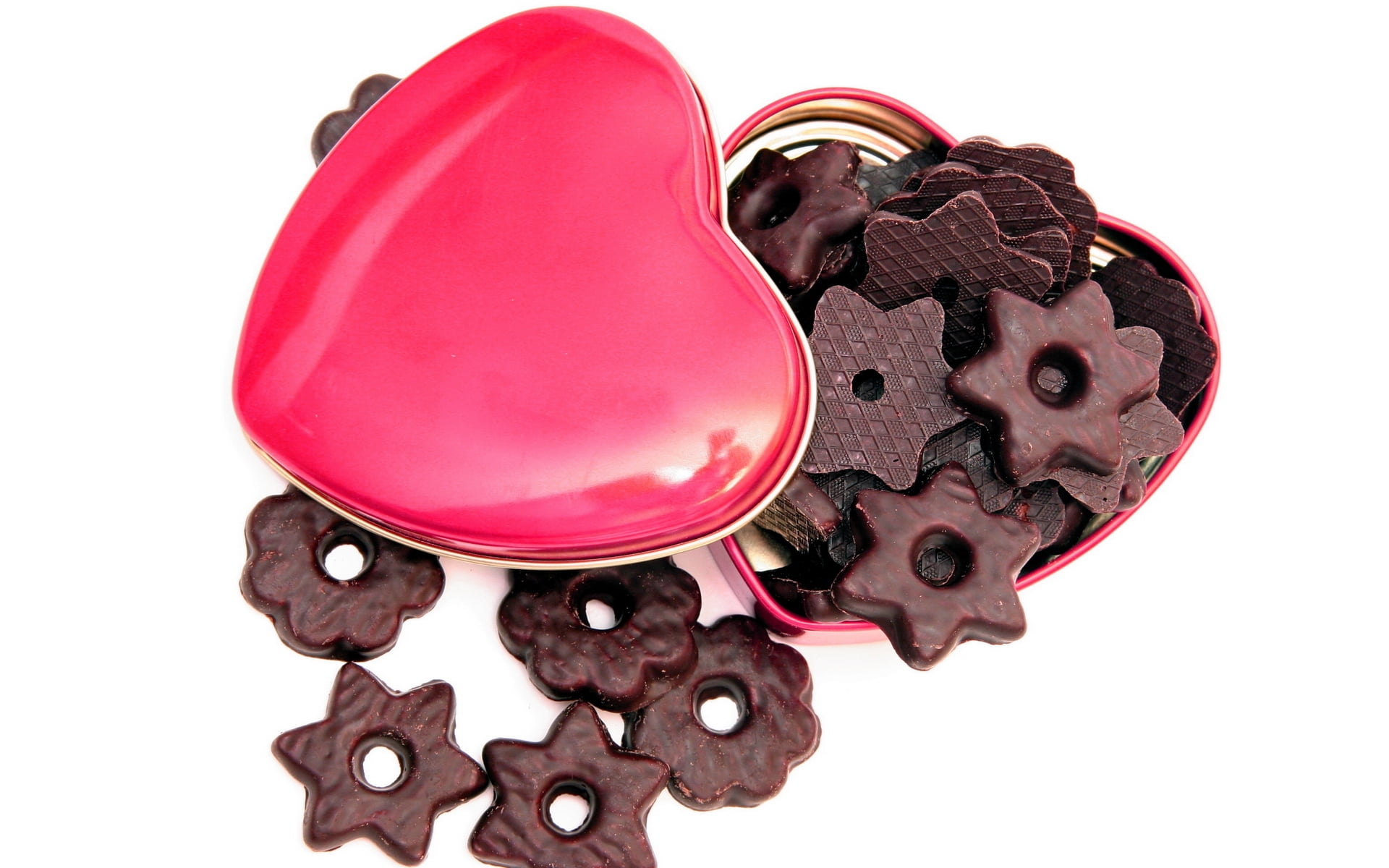 brown chocolate coated biscuits on red heart-shaped container