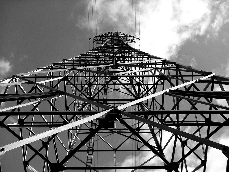 low angle photography of grey metal frames under cloudy sky HD wallpaper