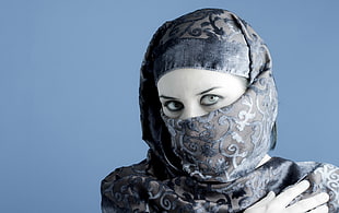 woman wearing gray lace hijab