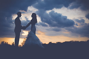 silhouette photography of bride and groom during golden hour HD wallpaper