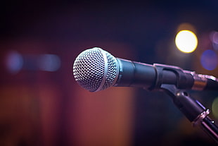 selective focus photography of black microphone