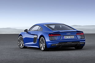 blue Audi coupe during daytime