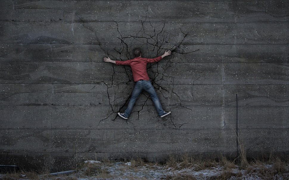 man on gray wall HD wallpaper