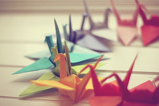 bird origami on white surface