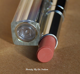 women's red lipstick bottle