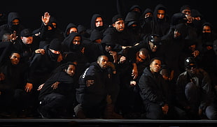 group of men's wearing black hoodie