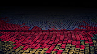 red, yellow, and blue concrete road