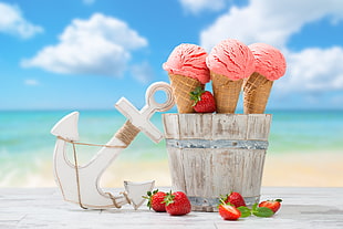 several ice cream with cones
