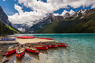 red canoe boats
