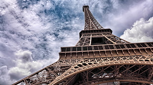 photo of Eiffel tower during daytime HD wallpaper