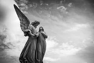 grey concrete angel statue