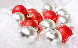 closeup photo of silver and red baubles