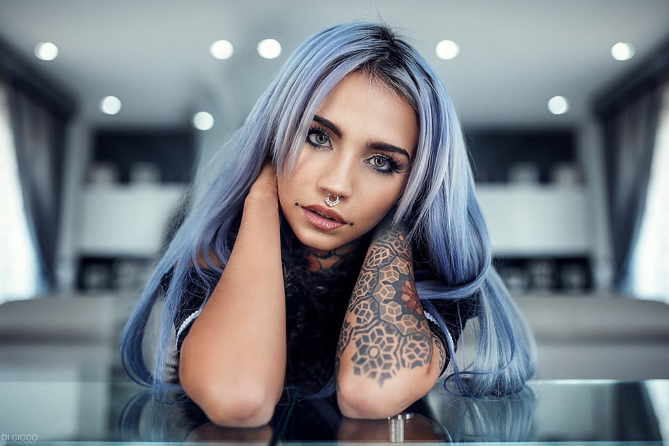 shallow focus photography of a woman with long blue hair and black tattoo on her left arm HD wallpaper