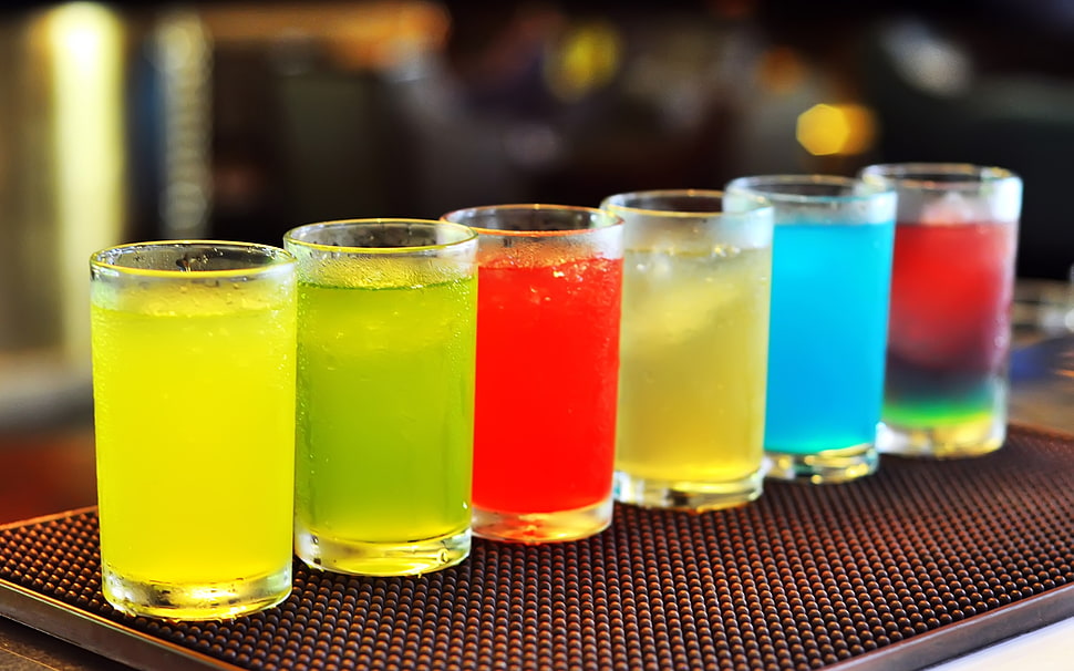 assorted colors liquid on clear drinking glasses HD wallpaper