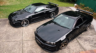 two black sports coupes