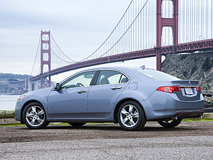 silver sedan near San Francisco Golden Gate bridge