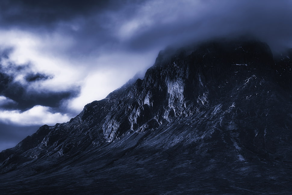 rocky mountain with clouds on tip HD wallpaper