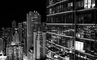 grayscale photo of gray high rise buildings