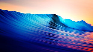 blue and red ocean wave digital wallpaper