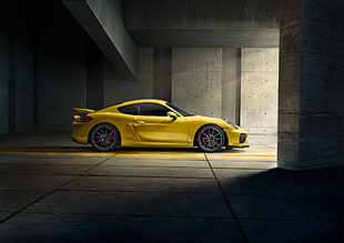yellow sports car inside building