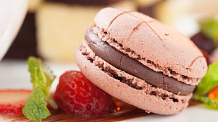 chocolate filled sandwich, strawberries, macaroons