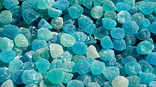 closeup photo of blue and white pebbles
