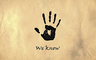 black hand print with We Know printed text