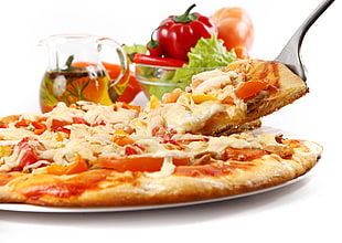 pizza on white plate on top of white surface HD wallpaper