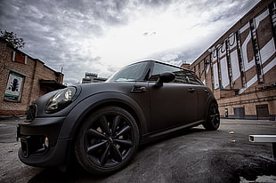 low angle shot of black Mini Cooper at daytime