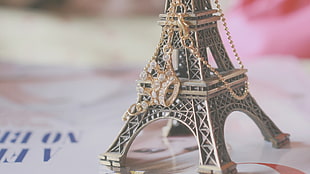 brown Eiffel Tower miniature