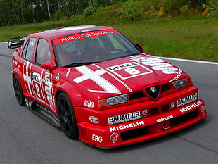 red Alfa Romeo rally car HD wallpaper