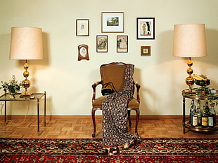 brown printed dress on brown padded armchair