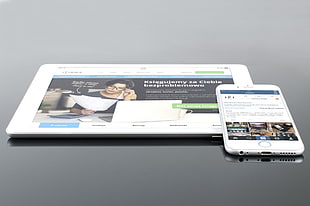 silver iPhone 6 beside silver iPad