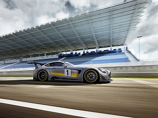 gray and yellow sports car on race track