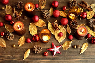 gold-colored leaves and red bauble decors HD wallpaper