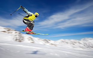 yellow and white jacket, sky, sport , flying, snow