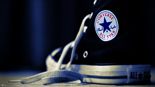 unpaired black Converse Allstar high-top, shoes