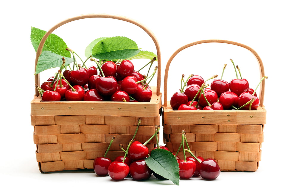 pile of cherry fruits with two wicker baskets HD wallpaper