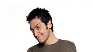 photo of man wearing gray shirt with white background