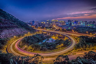 timelapse photography buildings near mountain and trees, xindian HD wallpaper