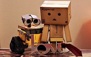 Wall-E and box-man near Love freestanding letters HD wallpaper
