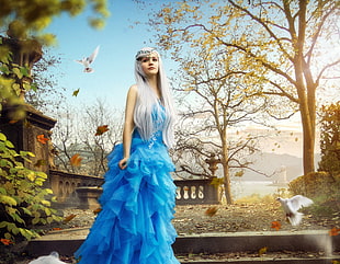 white hair girl in blue dress