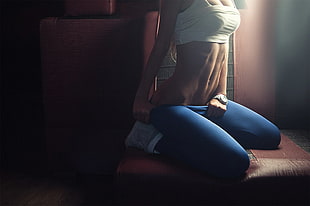 woman holding her blue leggings HD wallpaper