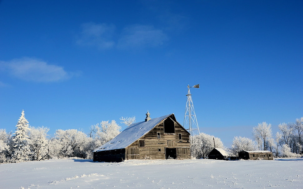 brown wooden barn near the white metal sattelite tower in winter season photo in daytime HD wallpaper