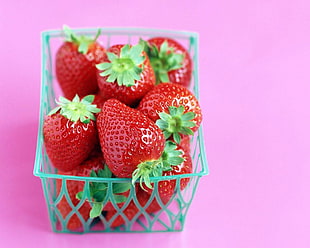 bunch of strawberry on basket