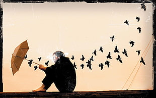 man holding umbrella surrounded by birds painting