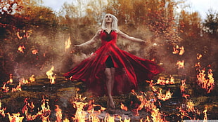 woman in red and black dress surrounded by fire digital wallpaper