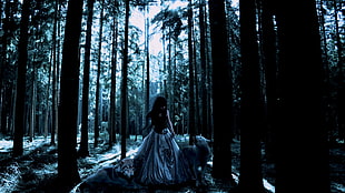 woman in black and white dress surrounded by two wolves in forest HD wallpaper