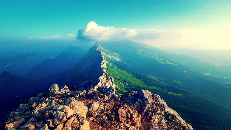 rocky mountain under cumulus clouds HD wallpaper