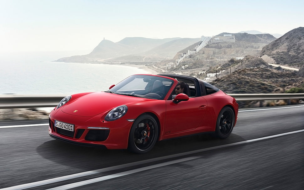 red Porsche 911 convertible on road during daytime HD wallpaper